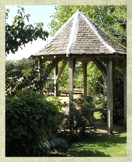Garden with large timber gazrbo